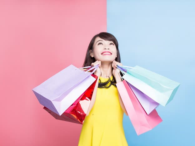 responsible shopping woman holding shopping bags