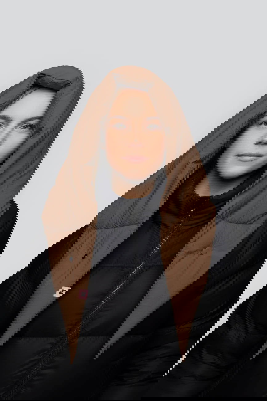 Winter Vegan Capuche Brown 4 Warm brown vegan capuche hood made from recycled materials worn over black puffer jacket. - The New Orchard - Warm Brown