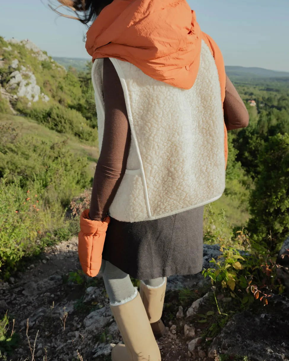 Vegan winter capuche in cinnamon color with recycled materials, worn over long-sleeve top and skirt outdoors. - The New Orchard - Fresh Cinnamon