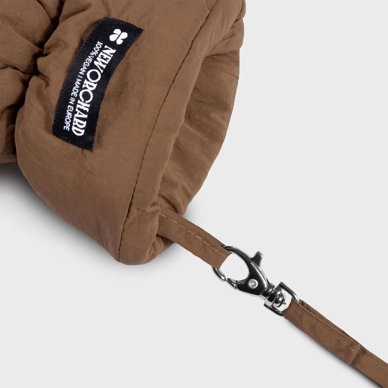 Winter Vegan Gloves Brown 3 Brown vegan winter glove with recycled materials, adjustable wrist strap, and black logo patch. - The New Orchard - Warm Brown