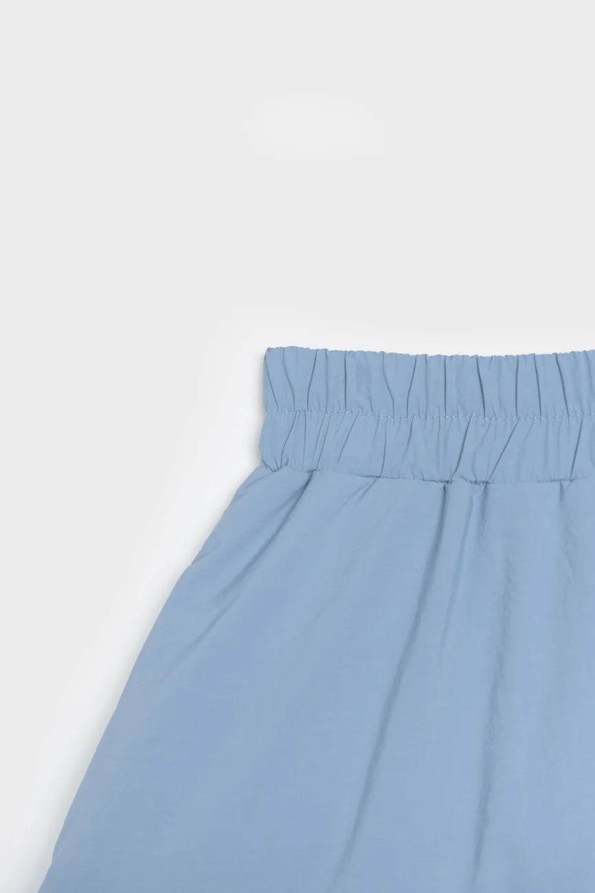 Winter Vegan Skirt Blue 2 Sky blue vegan skirt made from recycled materials with elastic waistband. - The New Orchard CH