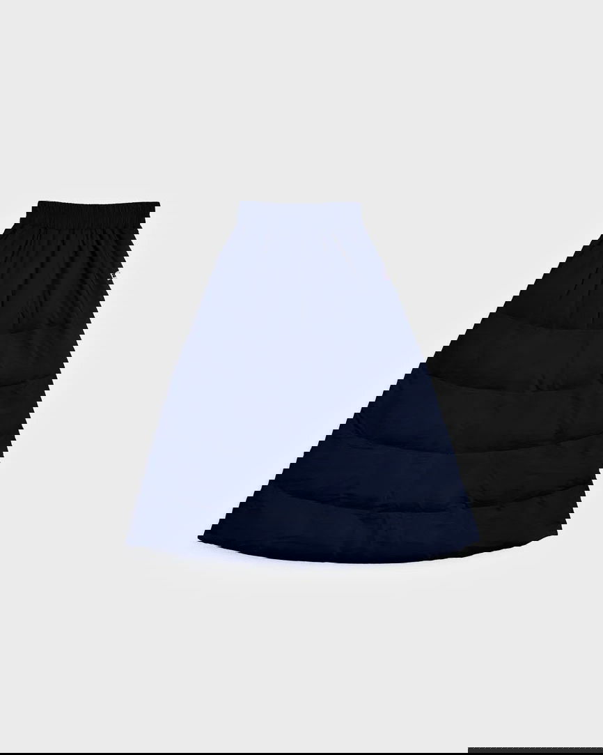 Navy blue vegan winter skirt made from recycled materials with quilted design. - The New Orchard CH