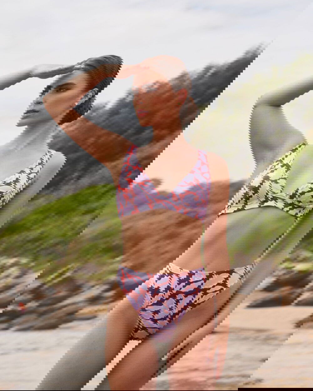 KEA mid-rise Brazilian bikini bottom in Magnolia Red, subtly high-cut leg